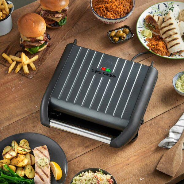 George Foreman Medium Electric Steel Grill [Non stick, Healthy, Griddle, Toastie, Hot plate, Panini, BBQ, Energy saving, Vertical storage, Easy clean, Drip tray, Ready to cook light] Grey, 1650W 25041