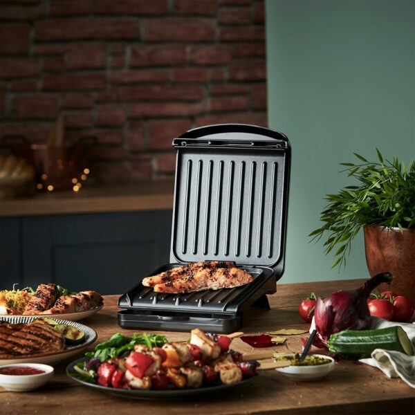 George Foreman Small Electric Fit Grill [Non stick, Healthy, Griddle, Toastie, Hot plate, Panini, BBQ, Energy saving, Vertical storage, Easy clean, Drip tray, Ready to cook light] Black, 760W 25800